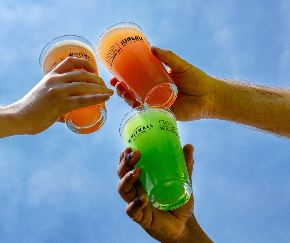 People "cheersing" drinks