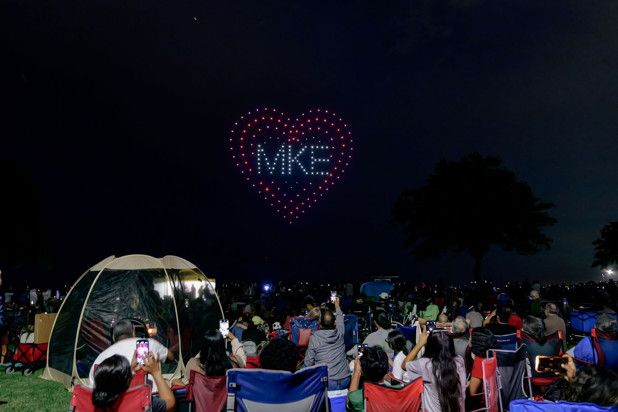 Drones in the shape of a heart with MKE in the middle