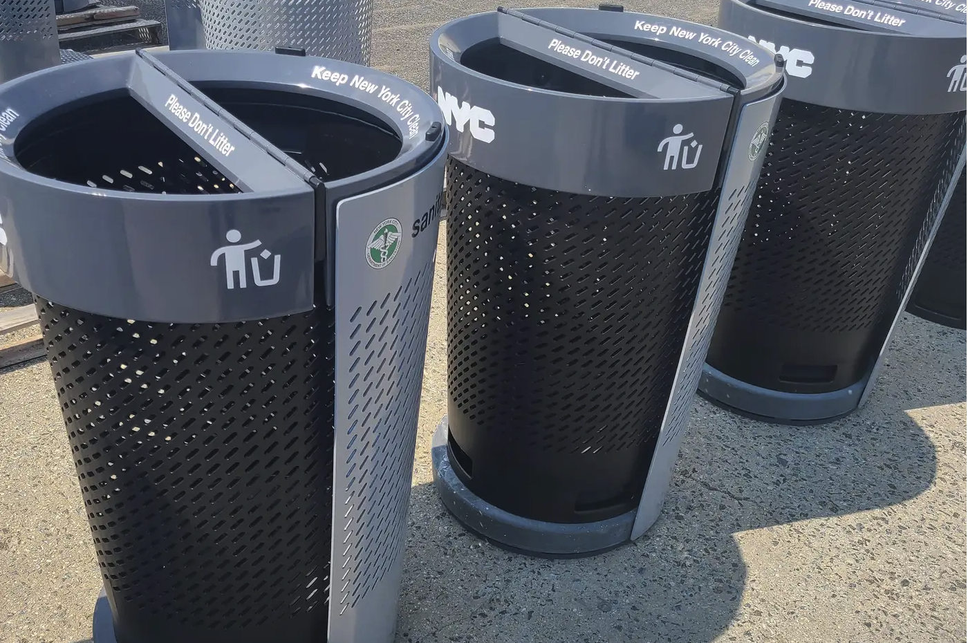 photo of trash cans on the street