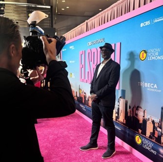 Deputy Commissioner Kwame Amoaku on the pink carpet for the premiere of Elsbeth 