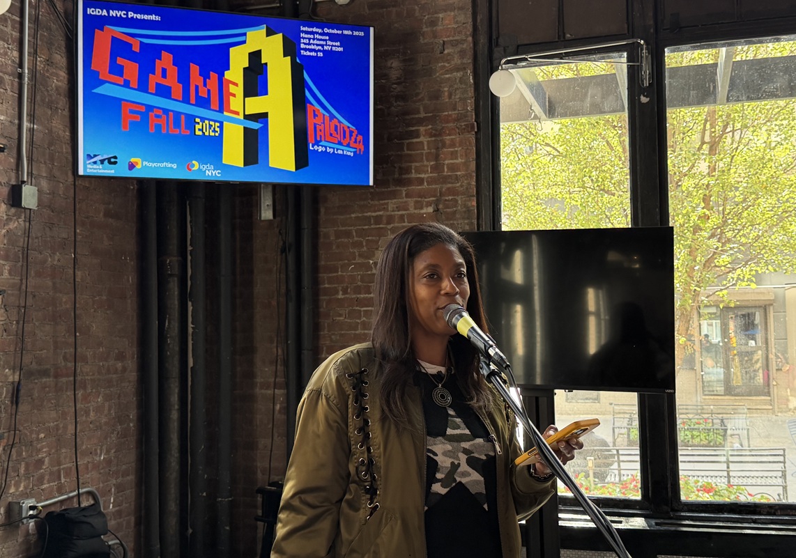 MOME’s Alia Jones-Harvey gives opening remarks at Game-a-Palooza