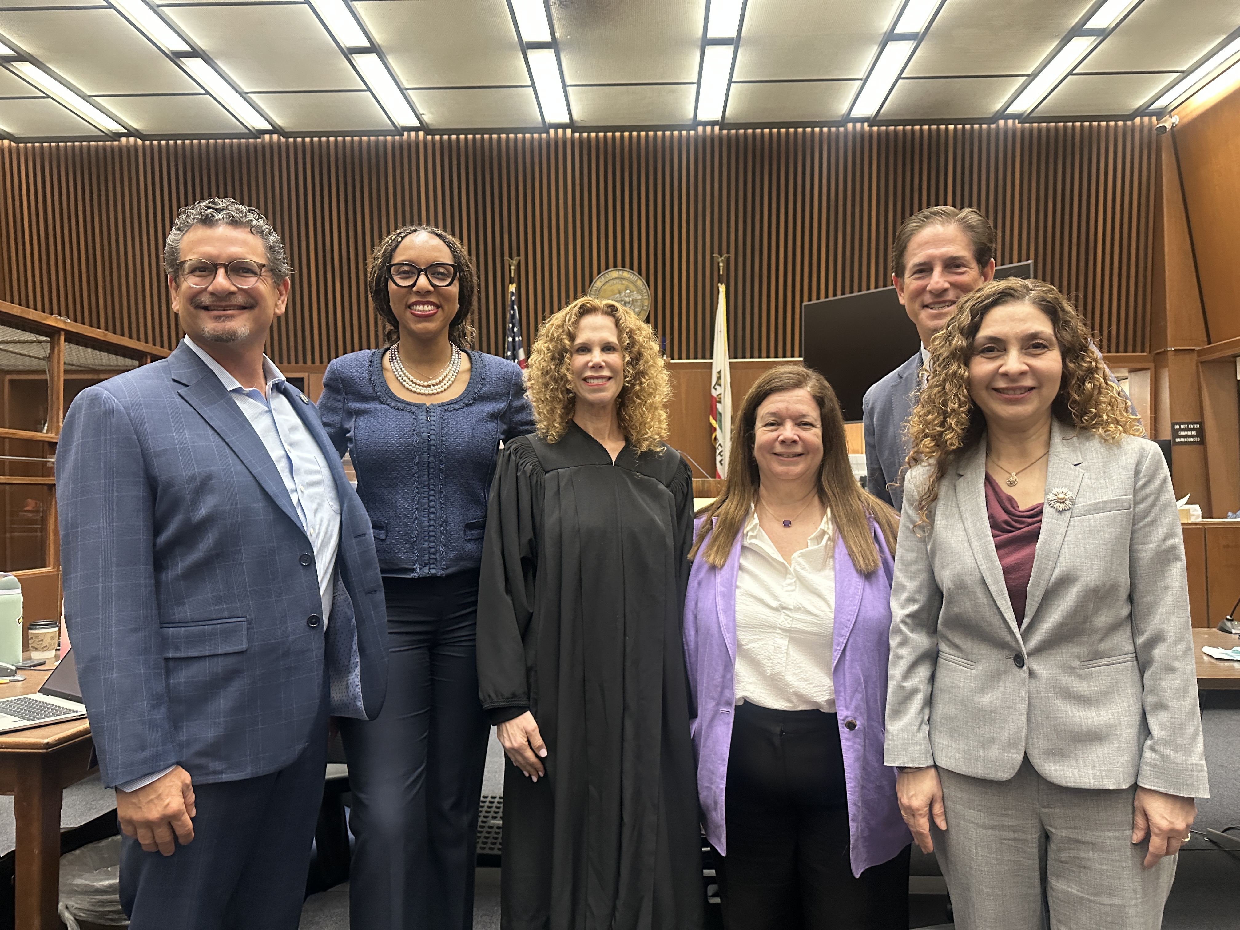 Los Angeles City Attorney Hydee Feldsten Soto stands with other representatives of the agencies partnering in the LA County Rapid Diversion Program: City Attorney Hydee Feldstein Soto with, l-r: Ricardo García, LA County Public Defender; Judge Songhai Armstead (Ret.), of the LA County Justice, Care and Opportunities Dept.; Judge Wendy Segall; District Attorney Nathan Hochman and Erika Anzoátegui, LA County Alternate Public Defender. 