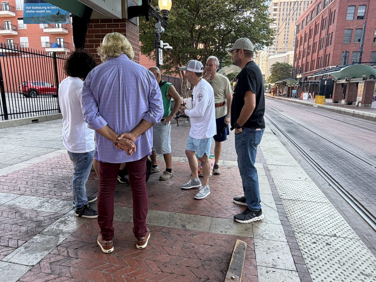 Praying with a man in need