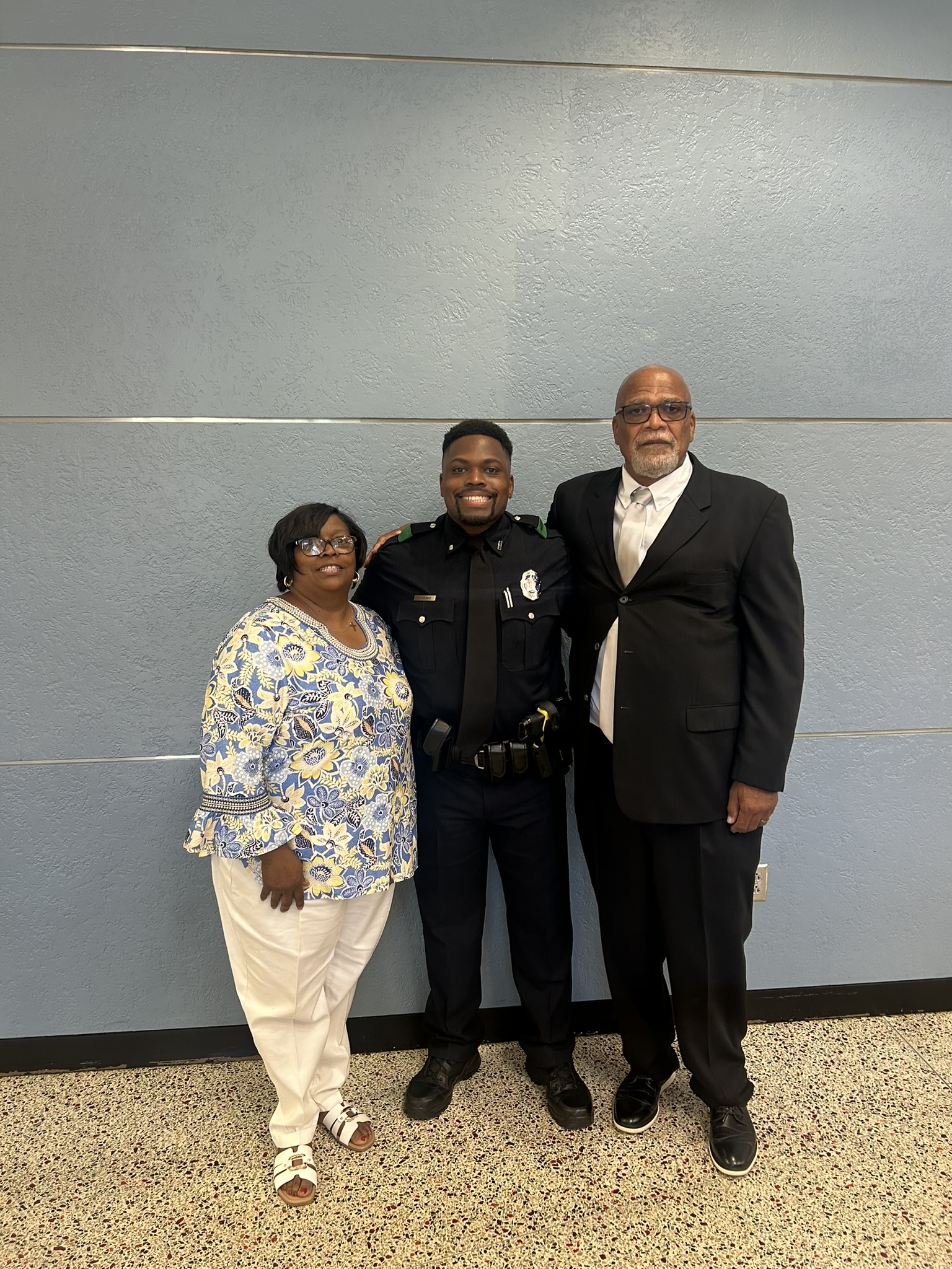 Kam Holmes with family