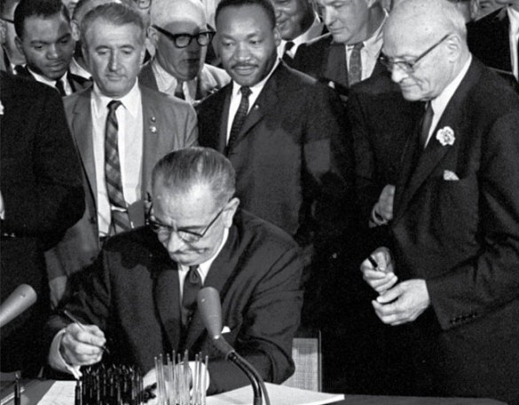 President Lyndon B. Johnson signs the Voting Rights Act, August 6, 1965