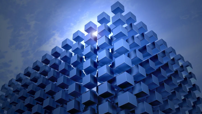 Blue-toned graphic showing two faces of a cube made of smaller cubes, lit behind by a mostly hidden yellow/white light