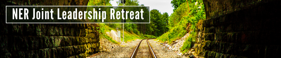 A train track runs through a tunnel and in between trees in the distance. White text reads: NER Joint Leadership Retreat.