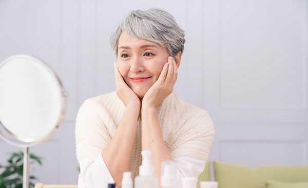 Woman looking in mirror