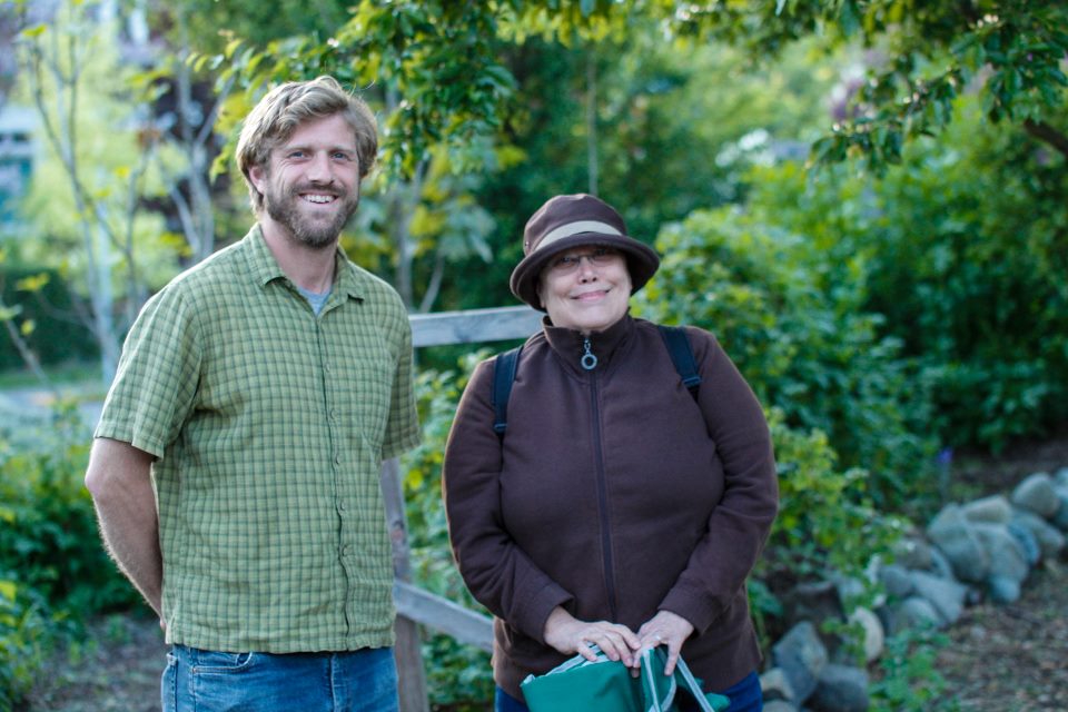 Ben and a resident at the Spring Ridge Common community garden
